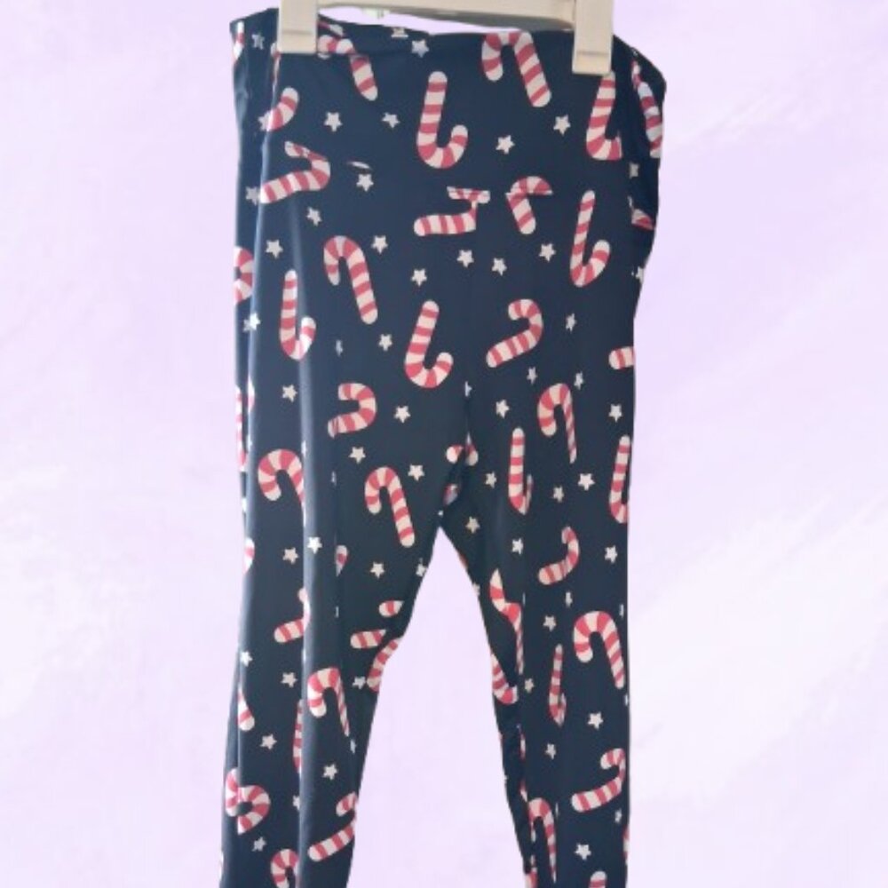 Tipsy Elves candy canes and stars all over leggings in black, red and white L